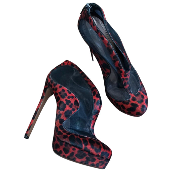 Boots Alaia rouges T.38,5