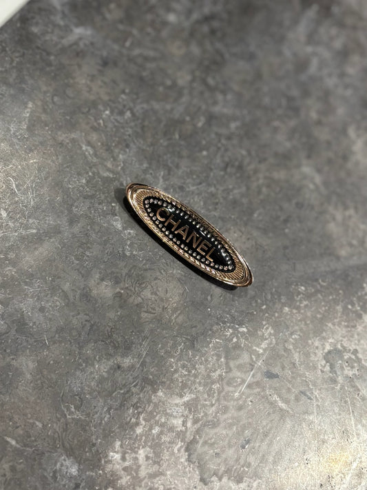Broche Chanel dorée
