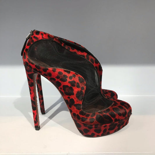 Boots Alaia rouges T.38,5