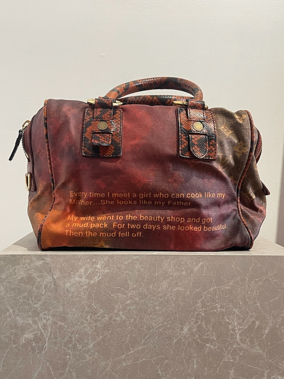 Sac Louis Vuitton Mancrazy rouge