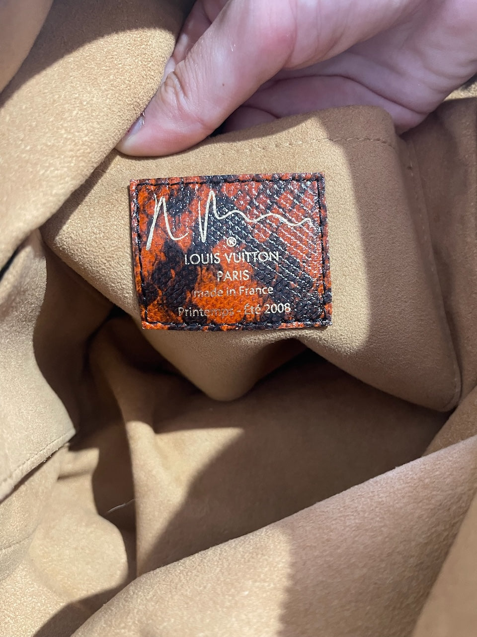 Sac Louis Vuitton Mancrazy rouge