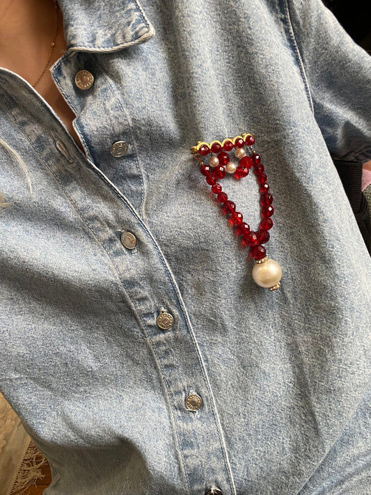 Broche Versace rouge