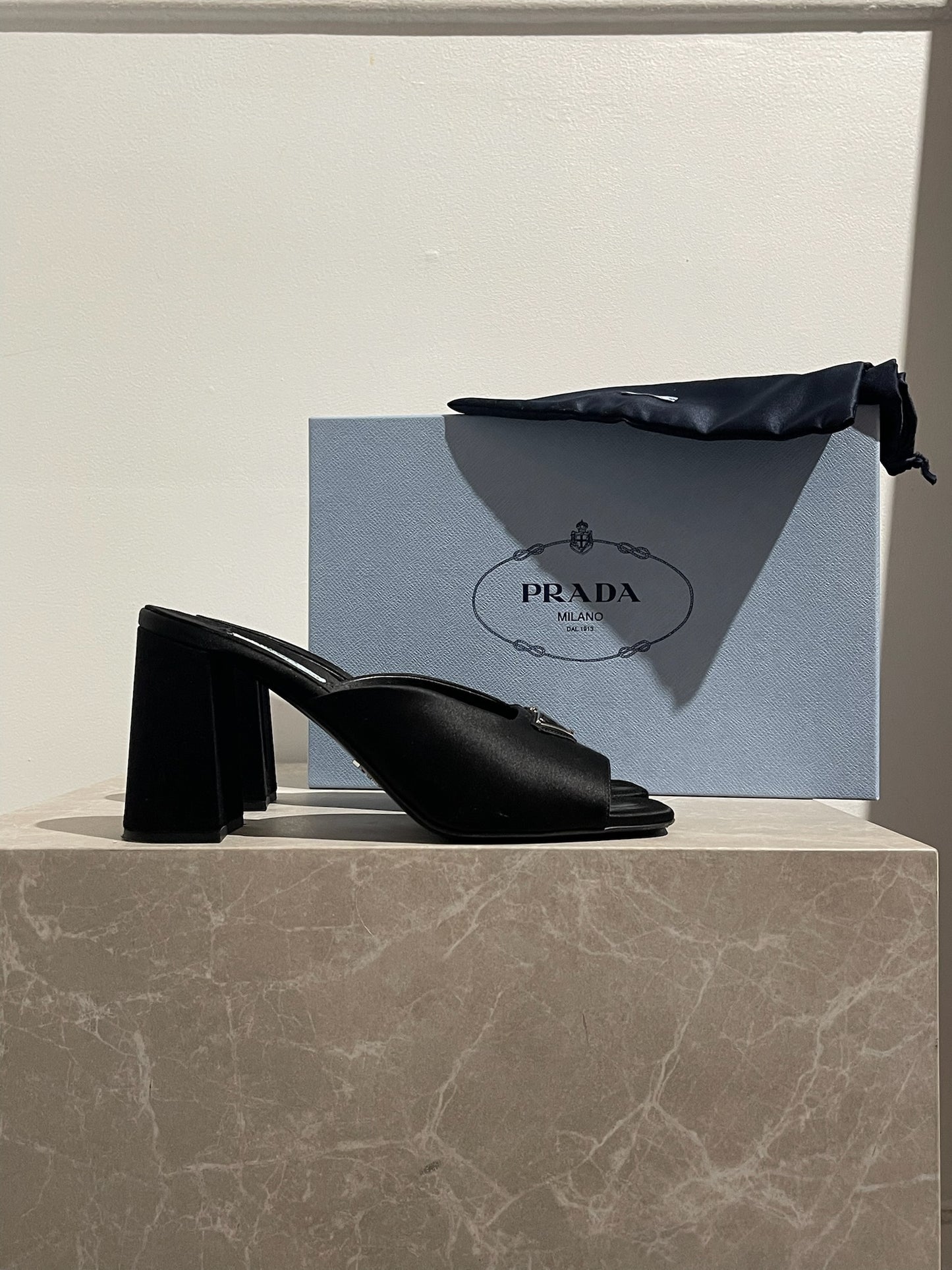 Mules Prada noires T.38