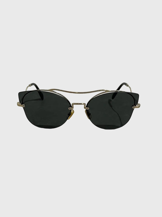 Lunettes Miu Miu dorées