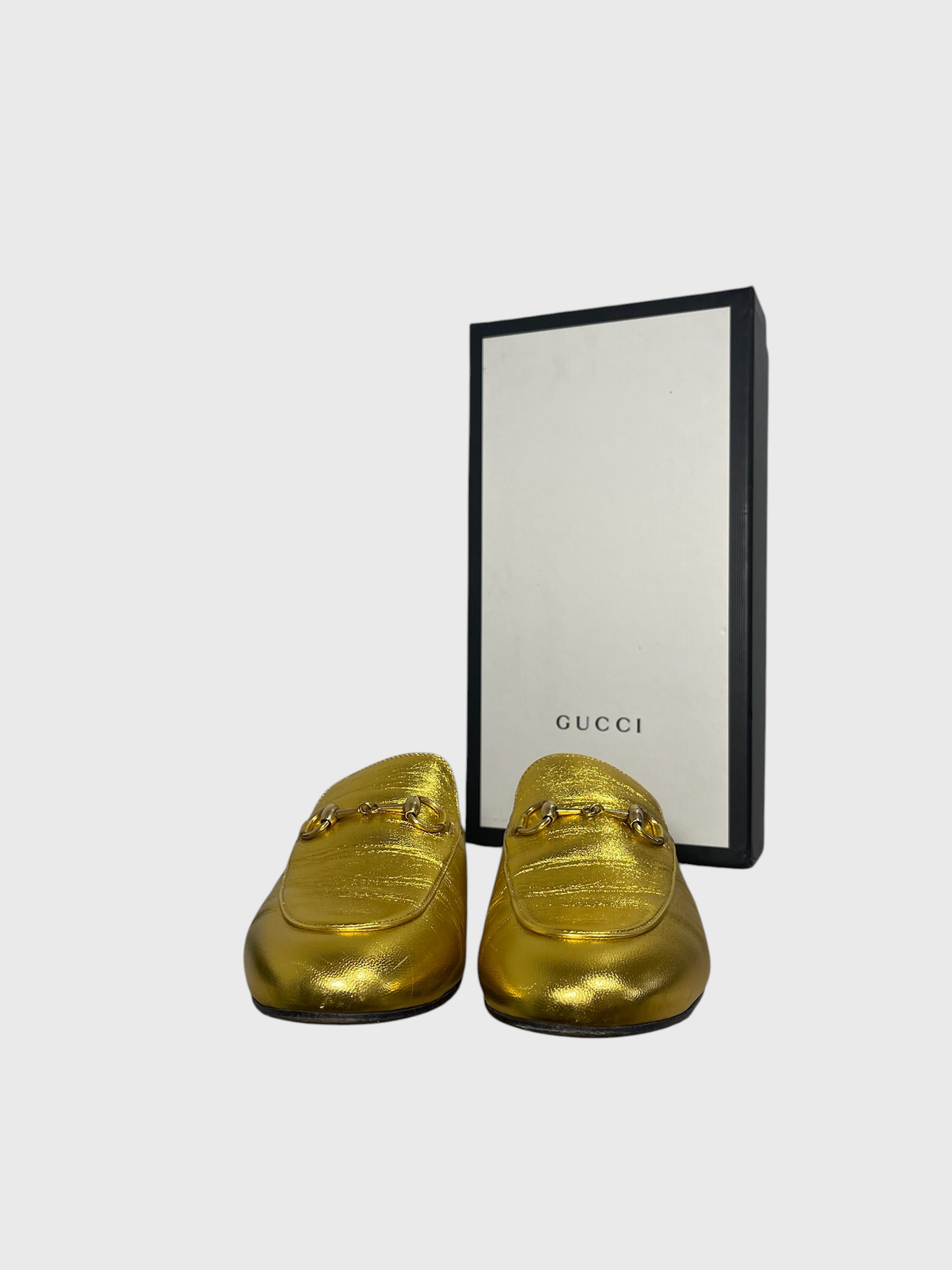 Mules Gucci Princetown dorées T.37