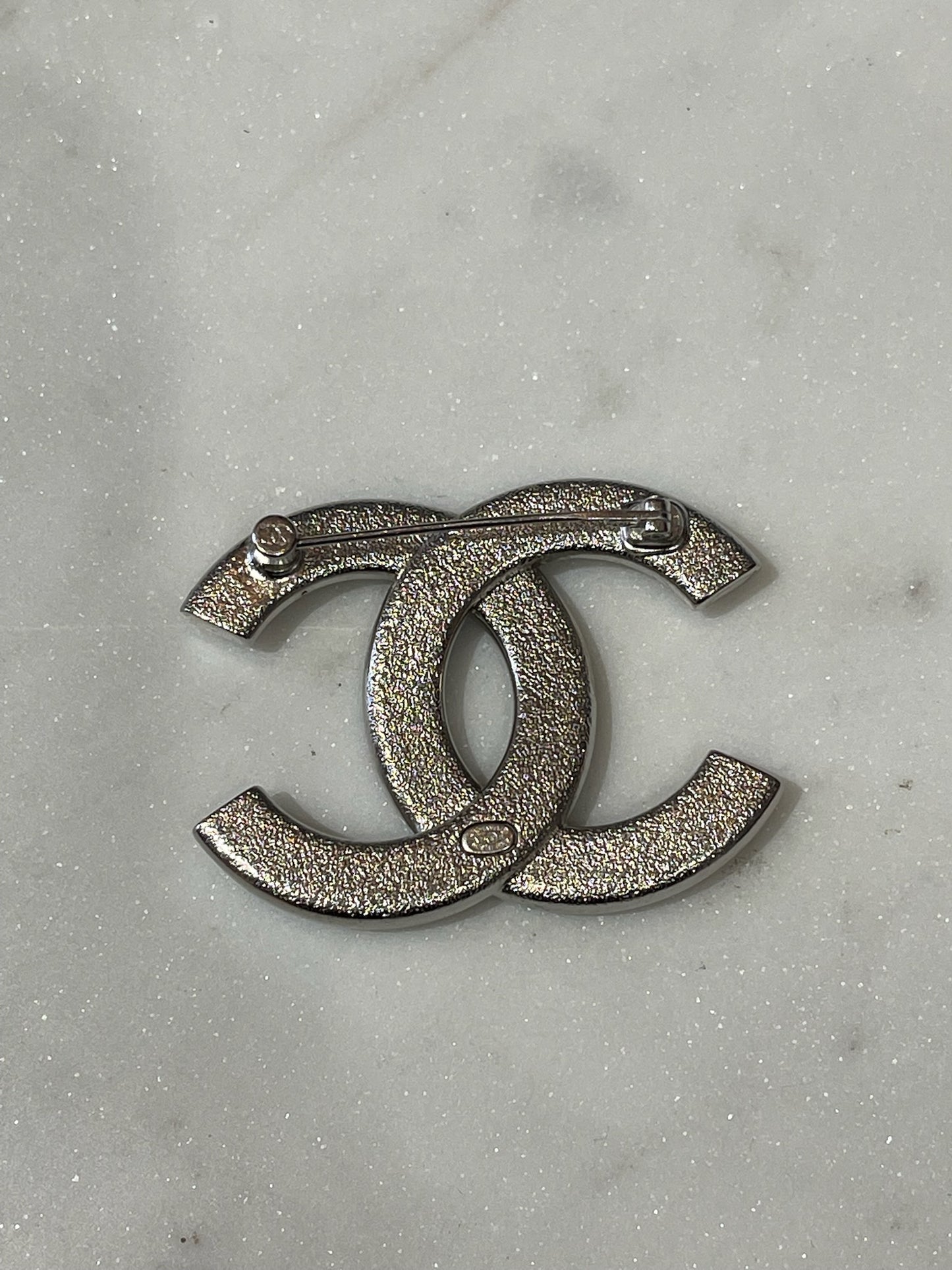 Broche Chanel argenté