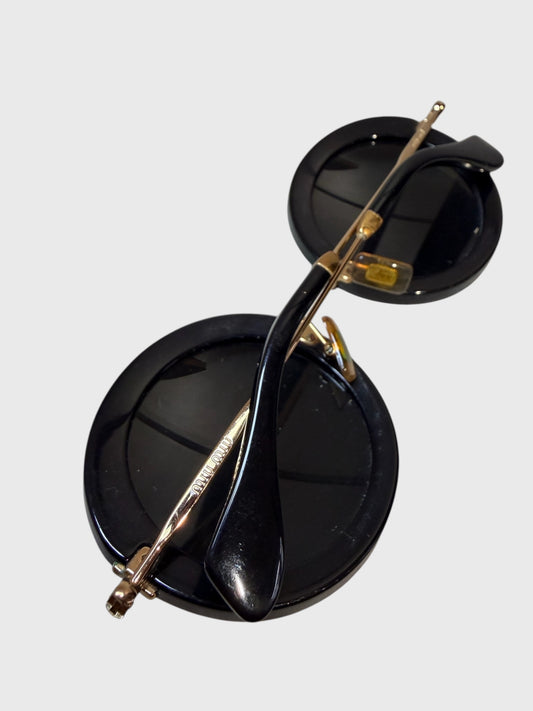 Lunettes de soleil Miu Miu noires