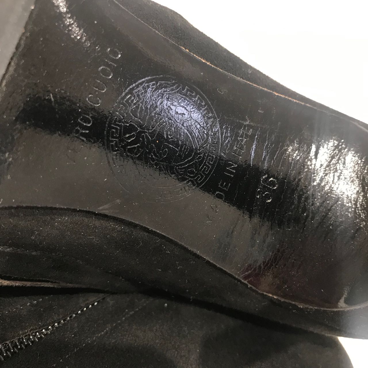 Boots Versace noires T.36
