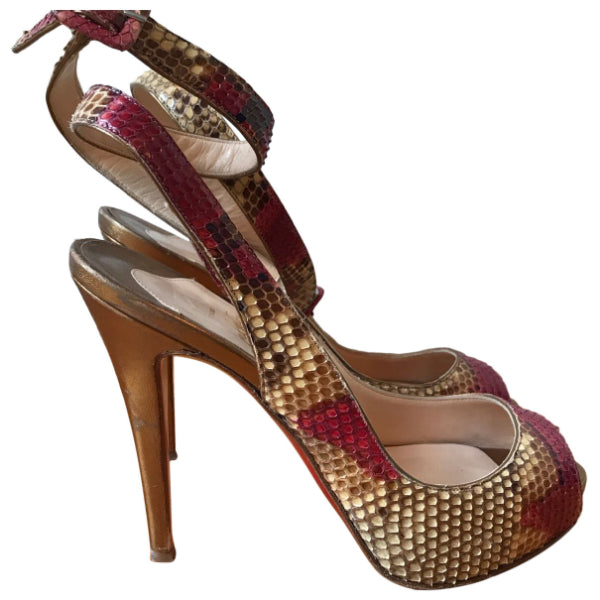 Louboutin best sale python femme