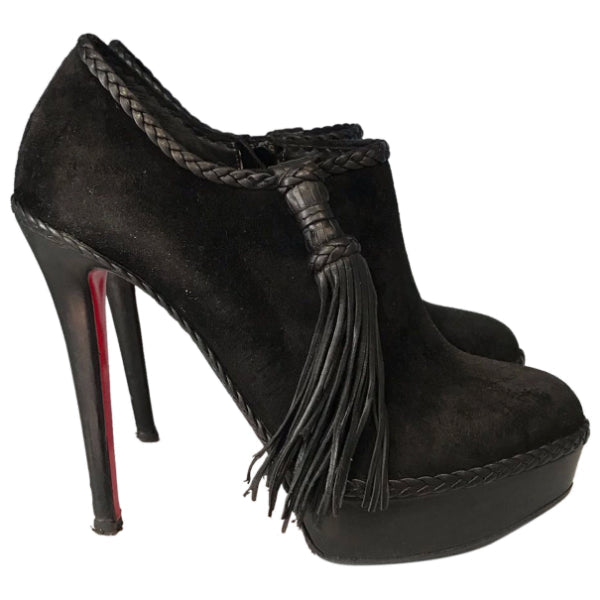 Boots Christian Louboutin noires T.38,5