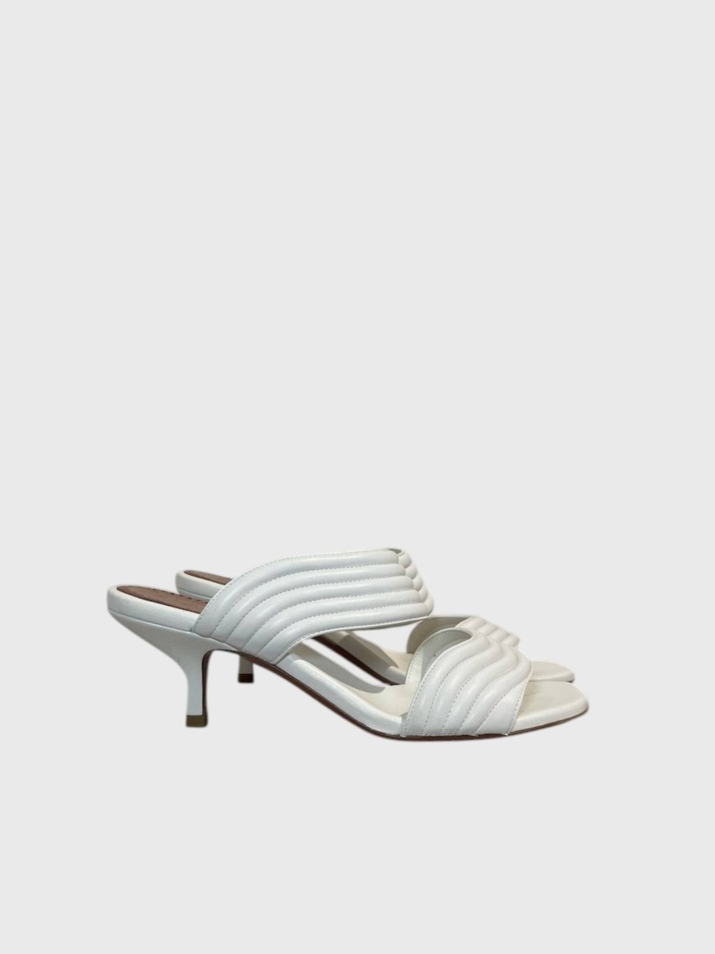 Mules Alaia blanches T.38