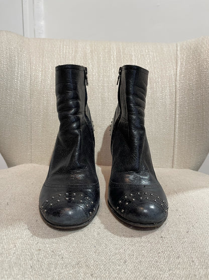 Boots Prada noires T.38,5