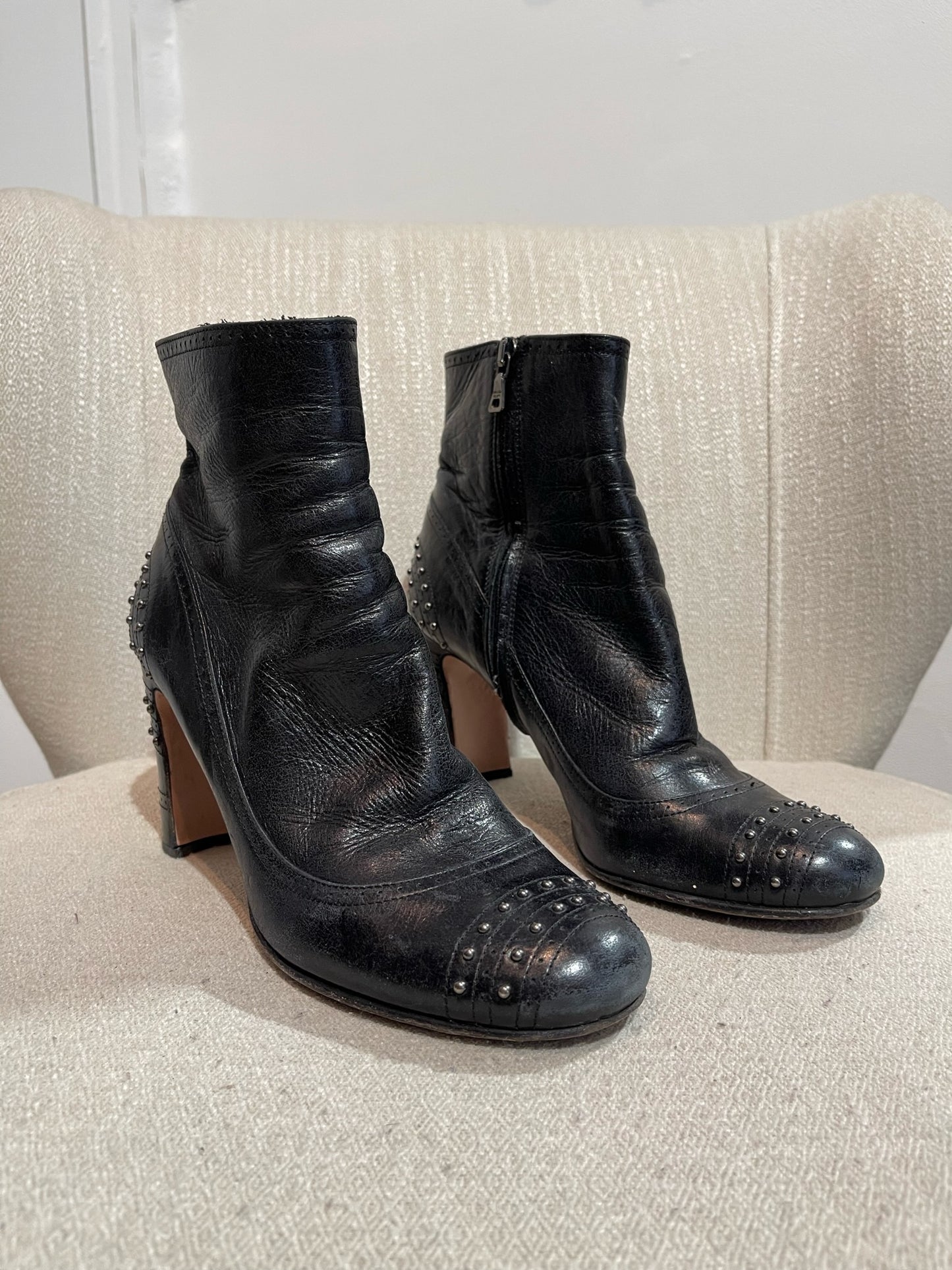 Boots Prada noires T.38,5