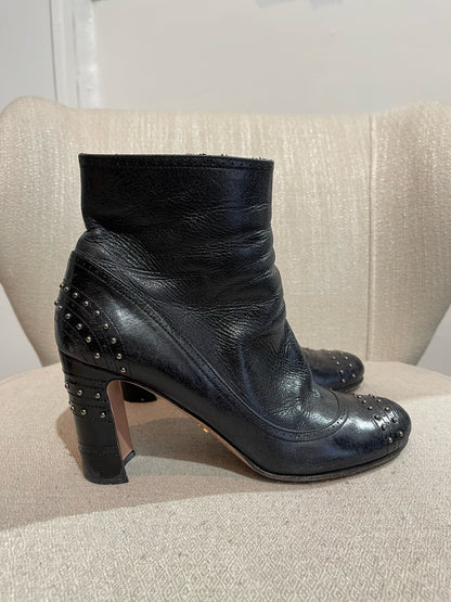 Boots Prada noires T.38,5