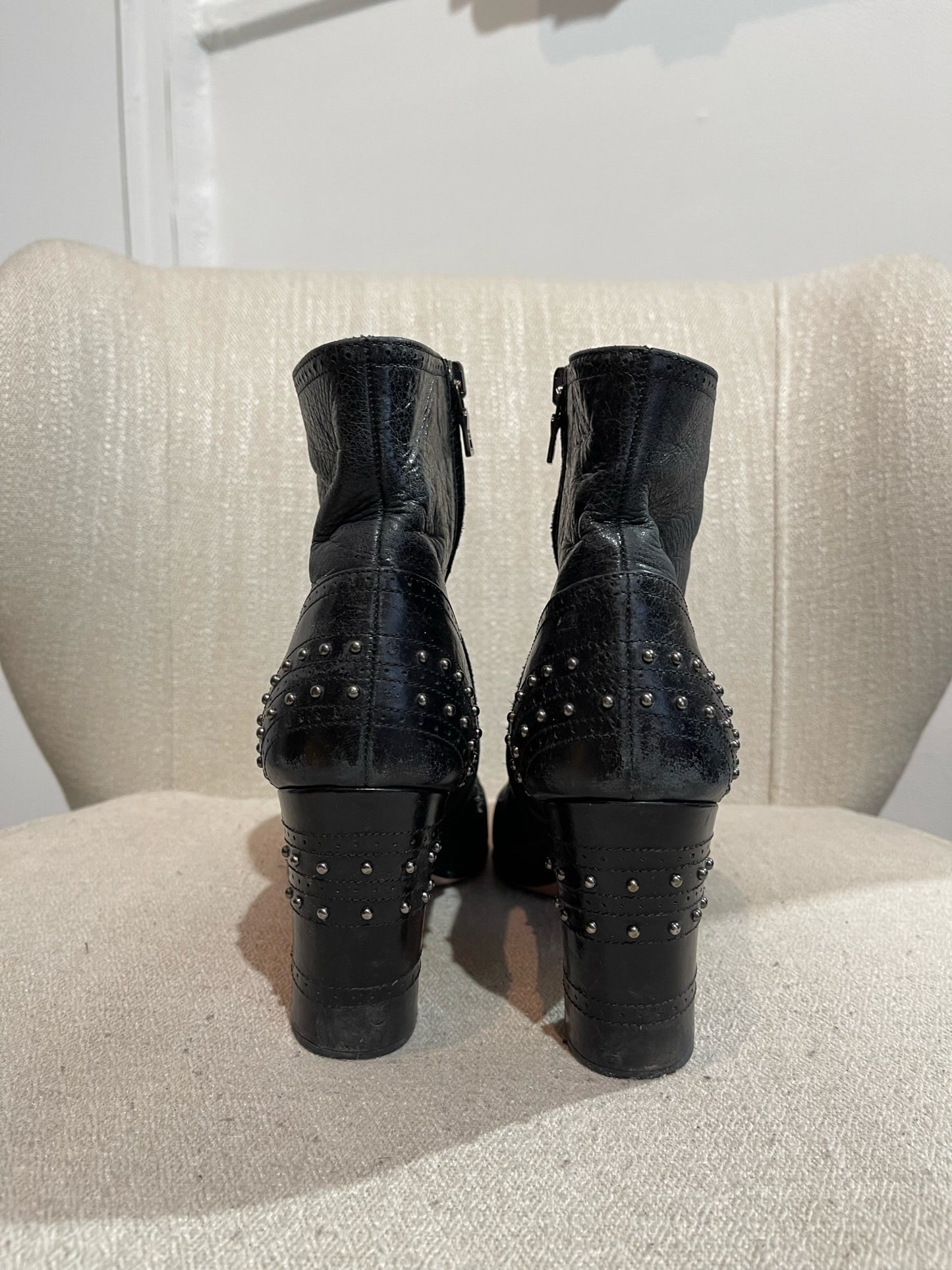 Boots Prada noires T.38,5