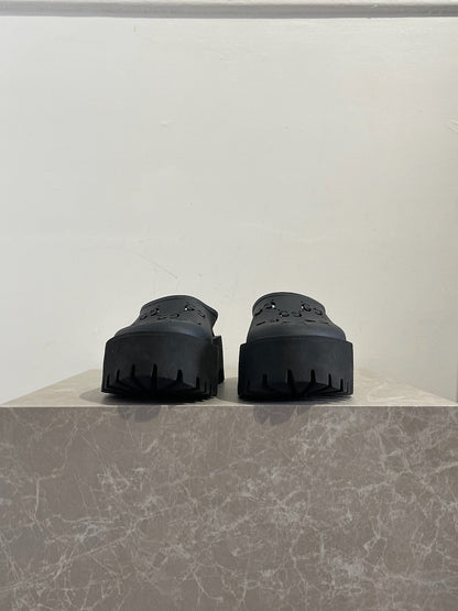 Mules Gucci noirs T.36