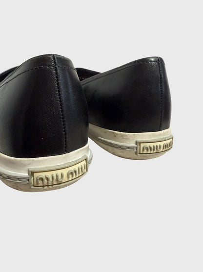 Mocassins Miu Miu noires T.36