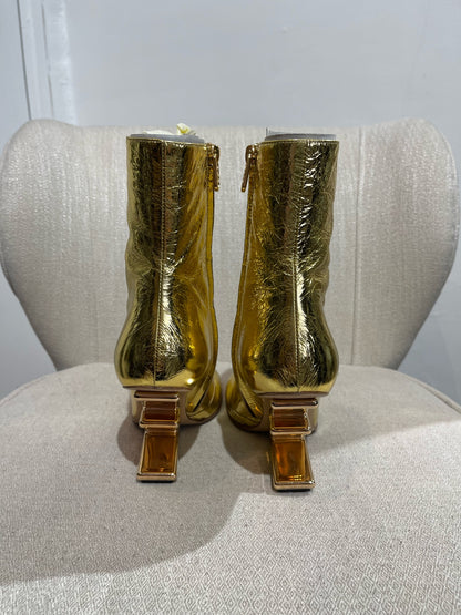 Boots Fendi dorées T.38