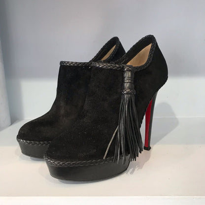 Boots Christian Louboutin noires T.38,5