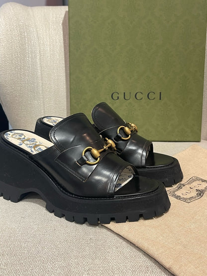 Mules Gucci noires T.38,5