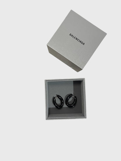 Boucles d'oreilles Balenciaga noires