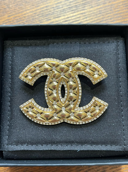 Broche Chanel CC dorée NEUVE