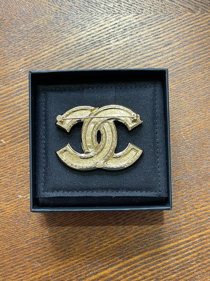 Broche Chanel CC dorée NEUVE