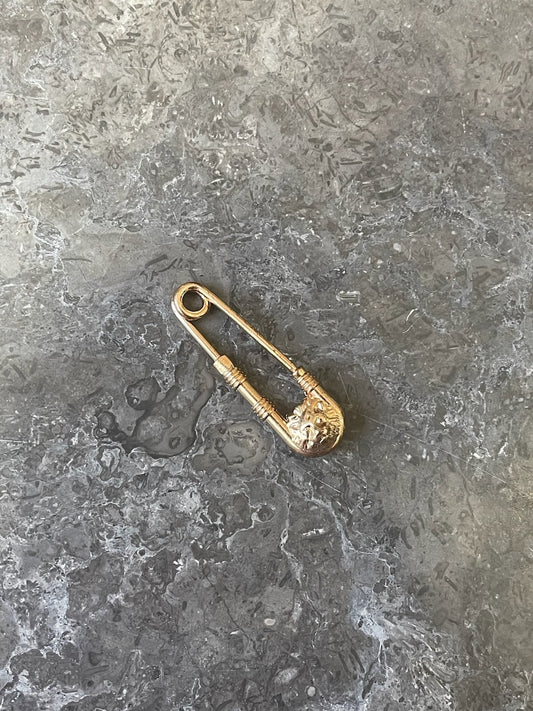 Broche Versace dorée
