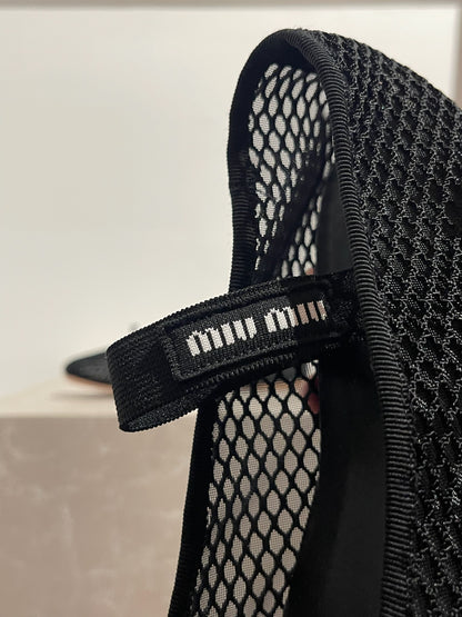 Ballerines Miu Miu noires T.38,5