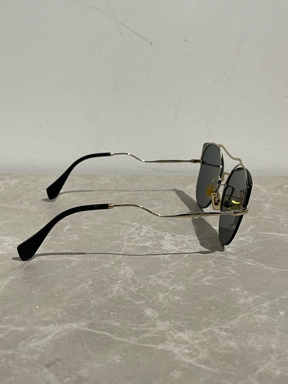 Lunettes Miu Miu dorées