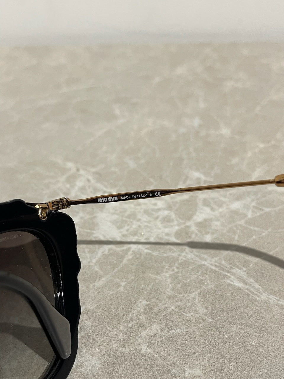 Lunettes Miu Miu noires