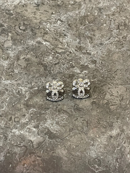 Boucles d'oreilles Chanel noeuds argents