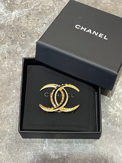 Broche Chanel Lune dorée