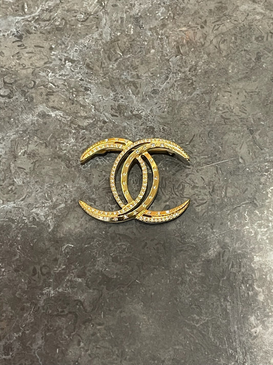 Broche Chanel Lune dorée