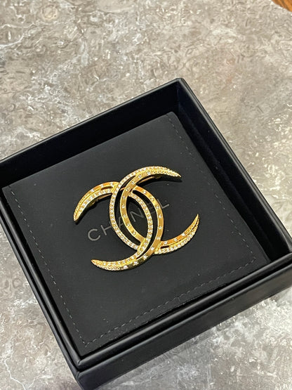 Broche Chanel Lune dorée