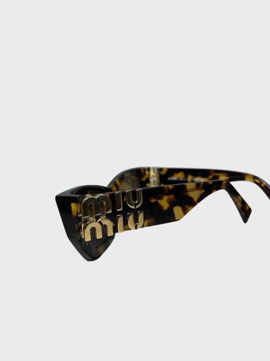 Lunettes de soleil Miu Miu en écaille