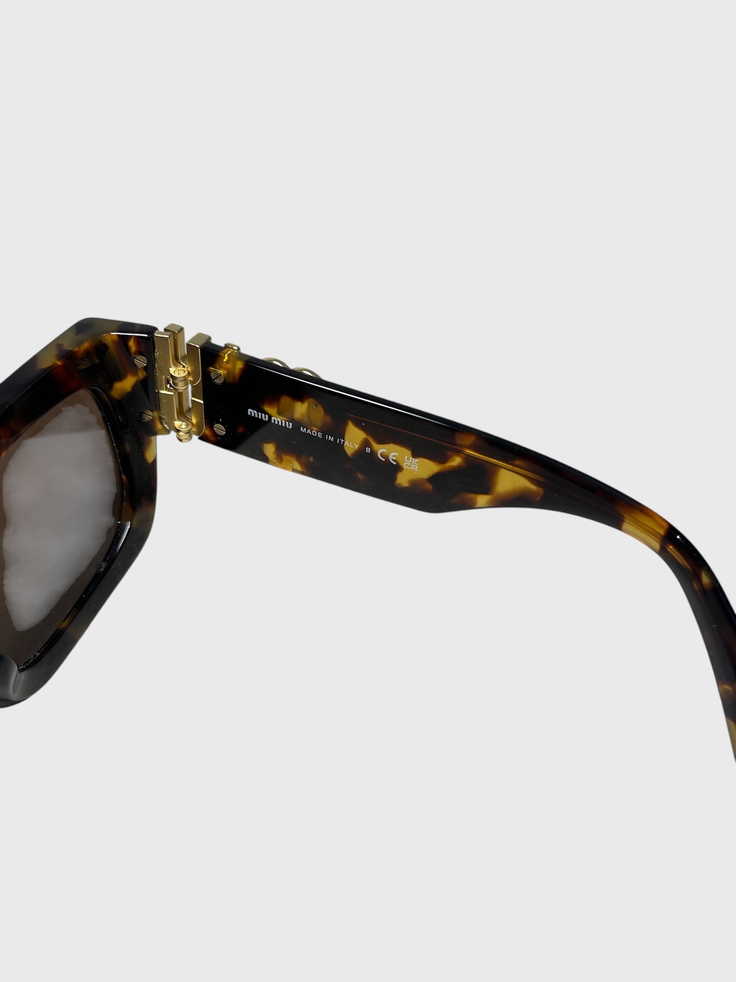 Lunettes de soleil Miu Miu en écaille