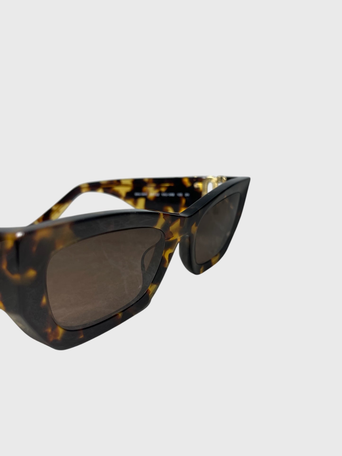 Lunettes de soleil Miu Miu en écaille