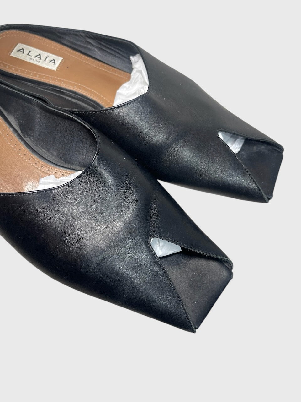 Mules Alaia Spike noires T.38