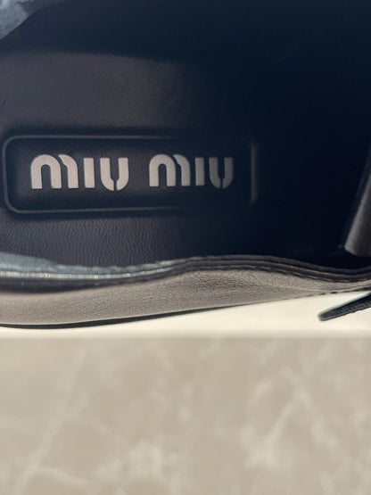 Richelieus Miu Miu noires T.39