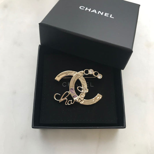 Broche Chanel CC dorée NEUVE