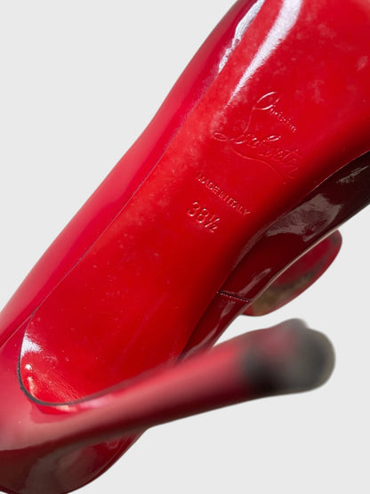 Escarpins Christian Louboutin rouges T.38,5