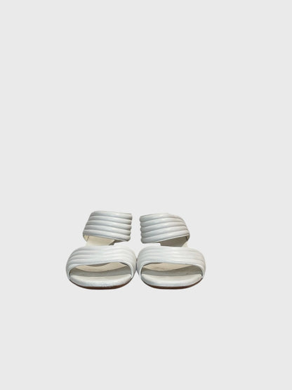 Mules Alaia blanches T.38