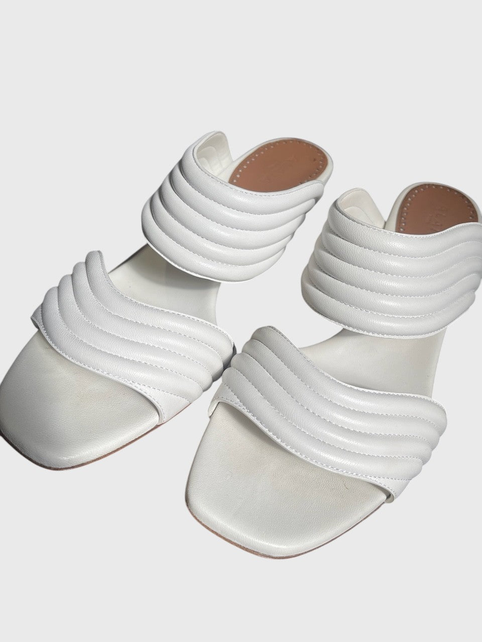 Mules Alaia blanches T.38