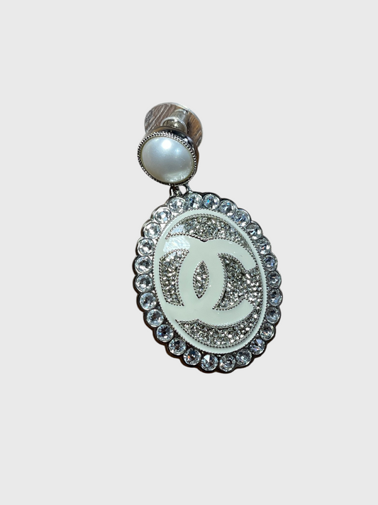 Boucles d'oreilles Chanel medaillon