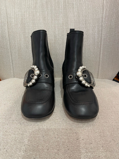 Boots Miu Miu noires T.37