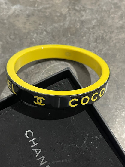 Bracelet Chanel jonc noir et jaune