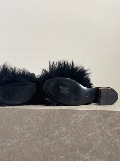 Mules Chanel noires T.37
