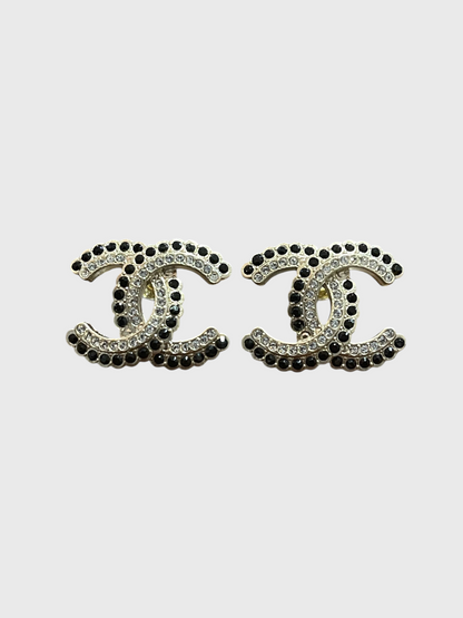 Boucles d'oreilles Chanel CC noires