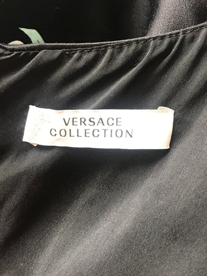 Robe Versace noire T.38